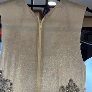 Elegant Beige Sleeveless Dress with Embellishments